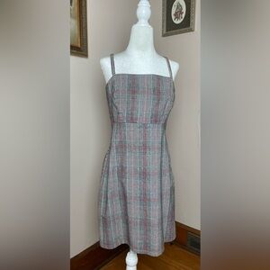 This dress is not only cute, but it's also as cute as a button, I love it!